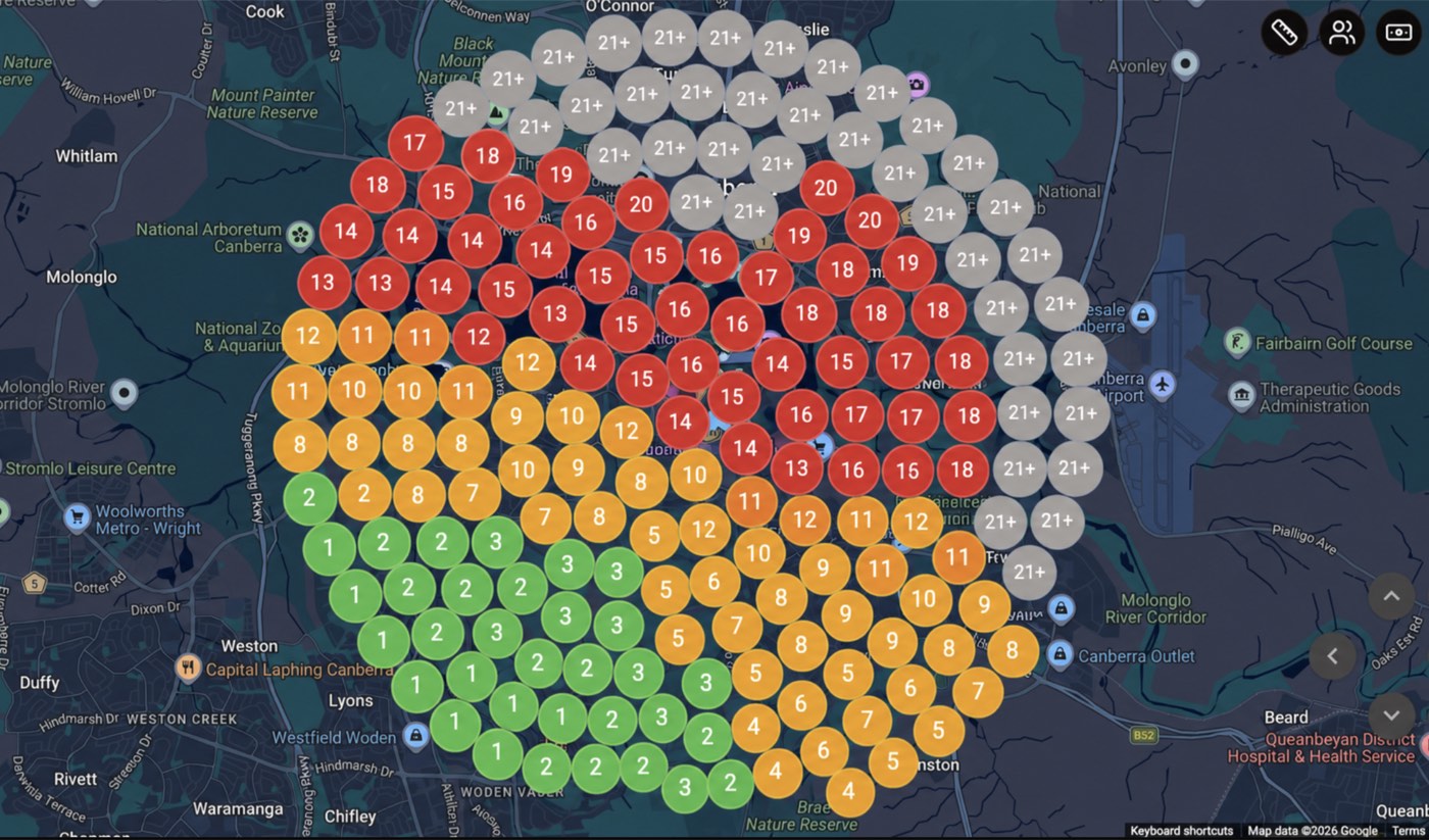 Geo-grid scan of a Canberra handyman client showing Map Pack rankings fading with distance from the business base