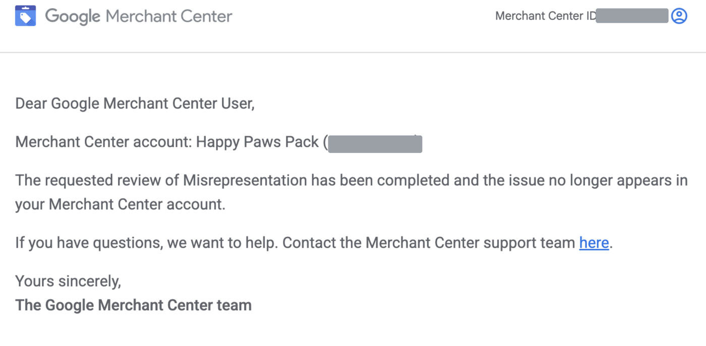 Google Merchant Center email confirming a misrepresentation review has been completed and the issue no longer appears in the account
