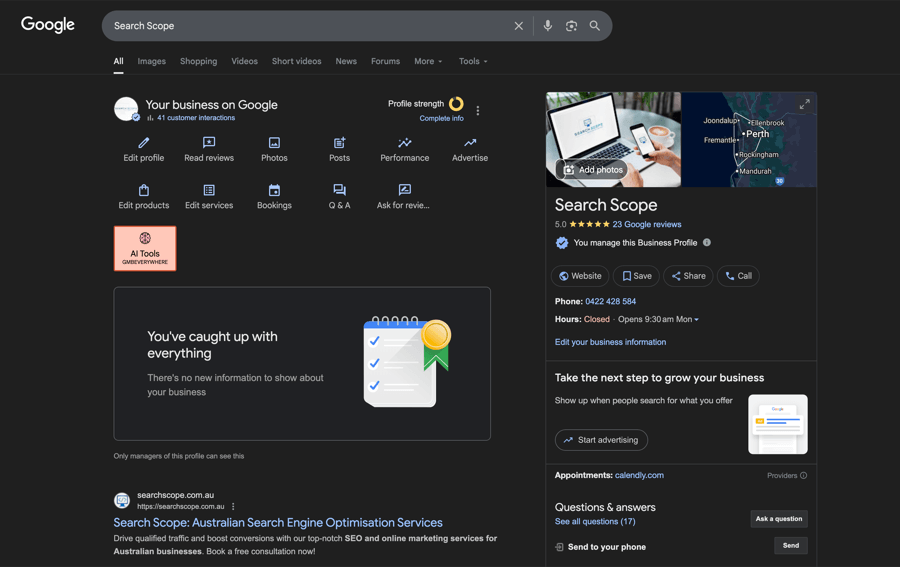 A business owner managing their Google Business Profile from a laptop