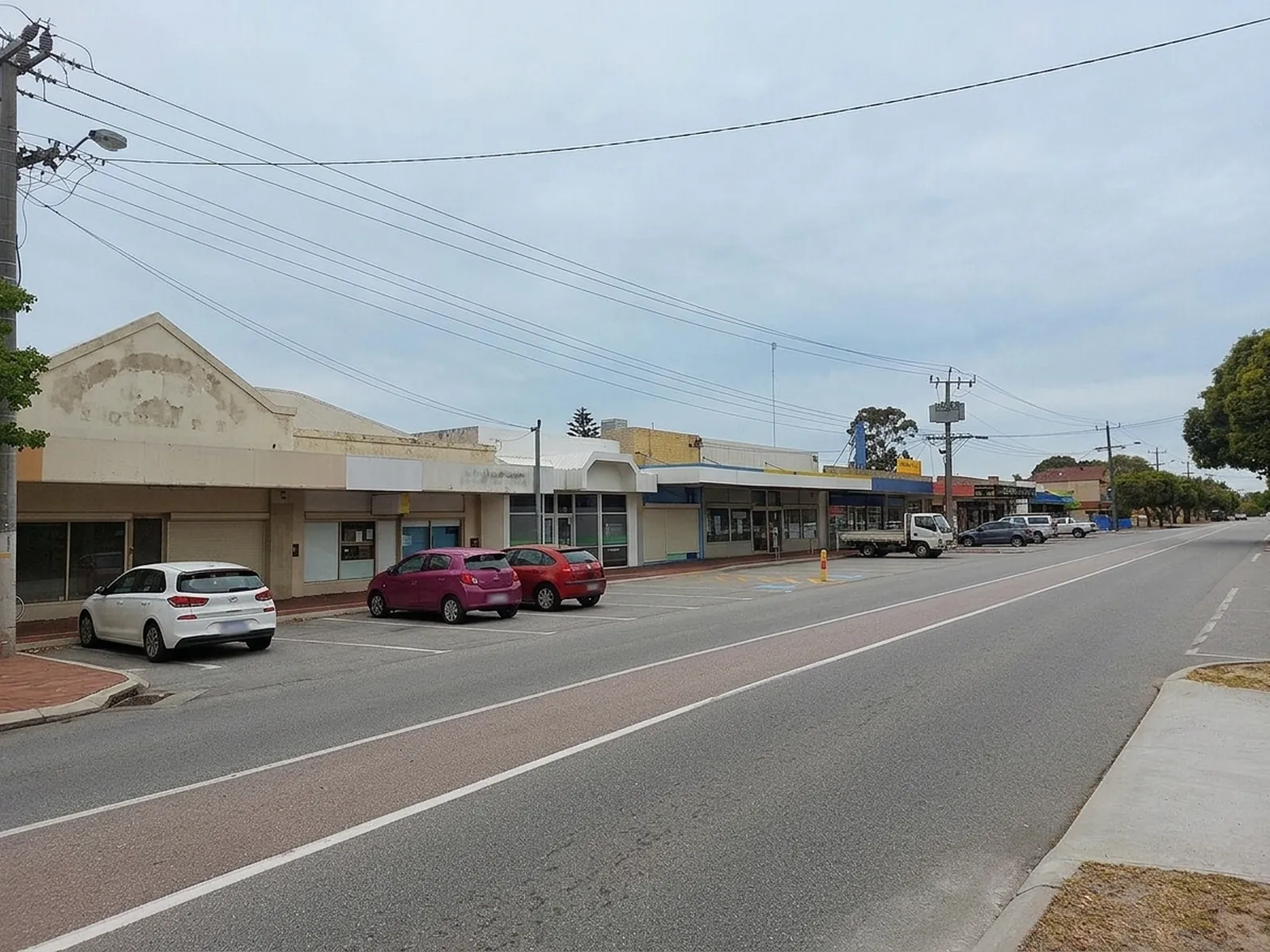 Low-rise suburban shopping strip in Belmont, Perth, the kind of local business strip where Map Pack visibility wins customers